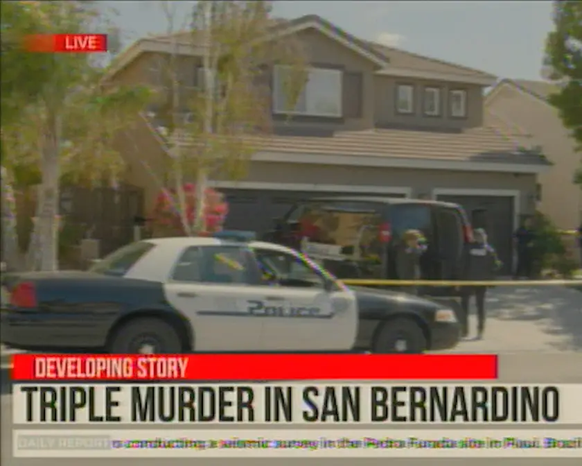 A TV screen featuring a police car in front of a house reads "triple murder in San Bernardino" in a still from the movie Strange Harvest