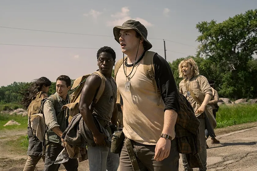 Joshua Odjick as Parker, Jordan Gonzalez as Harkness, David Jonsson as McVries, Cooper Hoffman as Garraty, and Charlie Plummer as Barkovitch in a still from The Long Walk, a movie whose ending is explained in this article