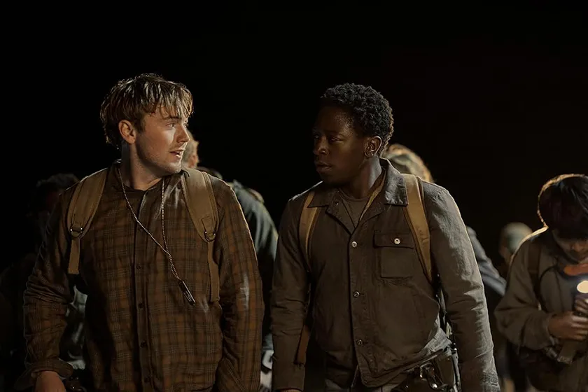 Cooper Hoffman as Garraty and David Jonsson as McVries in a still from The Long Walk, a movie whose ending is explained in this article
