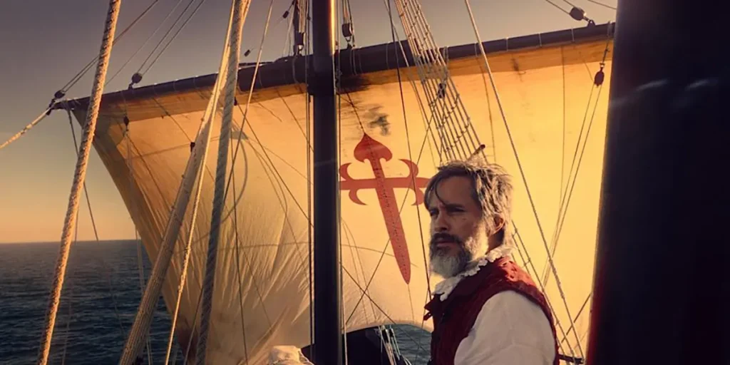 Gael Garcia Bernal stands on a ship in Lav Diaz's film Magellan (Magalhães)