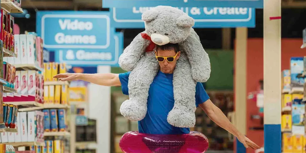Channing Tatum wears a lot of random things while inside a Toys R US in the movie Roofman