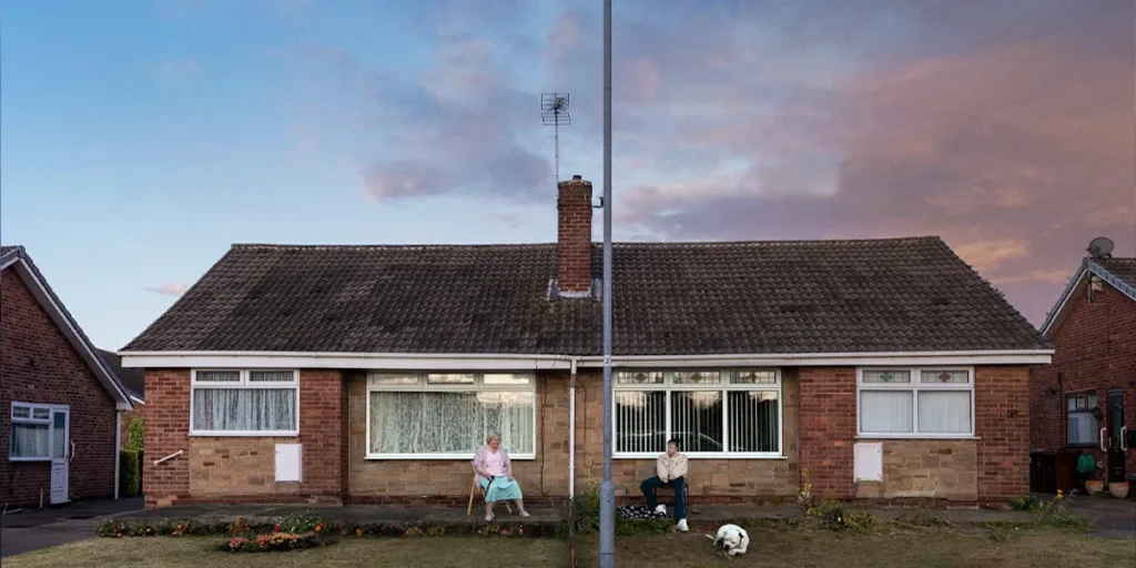 Andrea Riseborough and Brenda Blethyn sit outside their house in the film Dragonfly