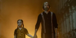 Mads Mikkelsen and Sophie Sloan hold hands in Dust Bunny