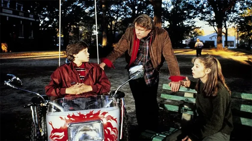 Corey Haim, Gary Busey, and Megan Follows in Silver Bullet (1985), one of the Top 15 best Stephen King Movies ranked from worst to best by Loud And Clear Reviews