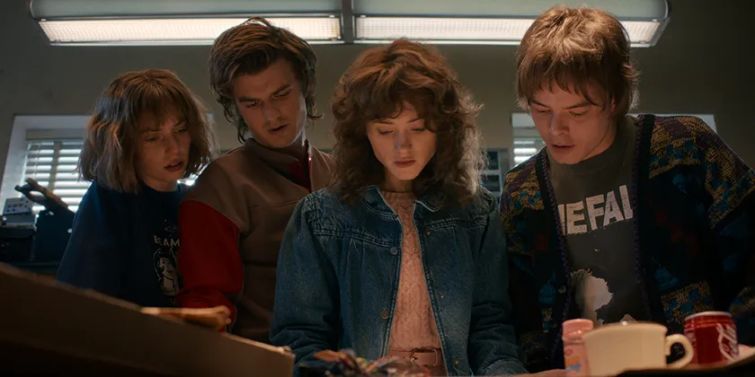 (L to R) Maya Hawke as Robin Buckley, Joe Keery as Steve Harrington, Natalia Dyer as Nancy Wheeler, and Charlie Heaton as Jonathan Byers in Stranger Things 5 Vol. 1
