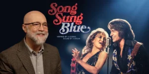 Director Craig Brewer, whom we interview, and the poster of the movie Song Sung Blue