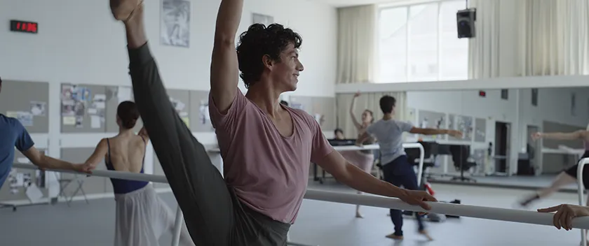Fernando (Isaac Hernández) is doing warm up exercises at the San Francisco Ballet in a still from Michel Franco's Dreams (2026)