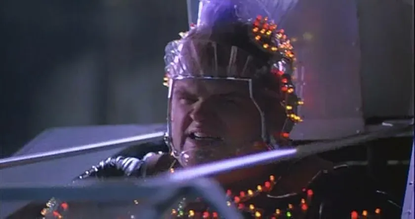 A still from The Running Man, whose new movie (2025) is better than the original according to Loud And Clear Reviews