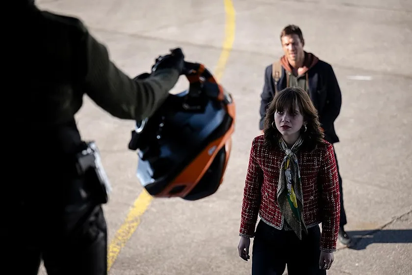 Emilia Jones in a still from the new Running Man movie (2025), which is better than the original according to Loud And Clear Reviews