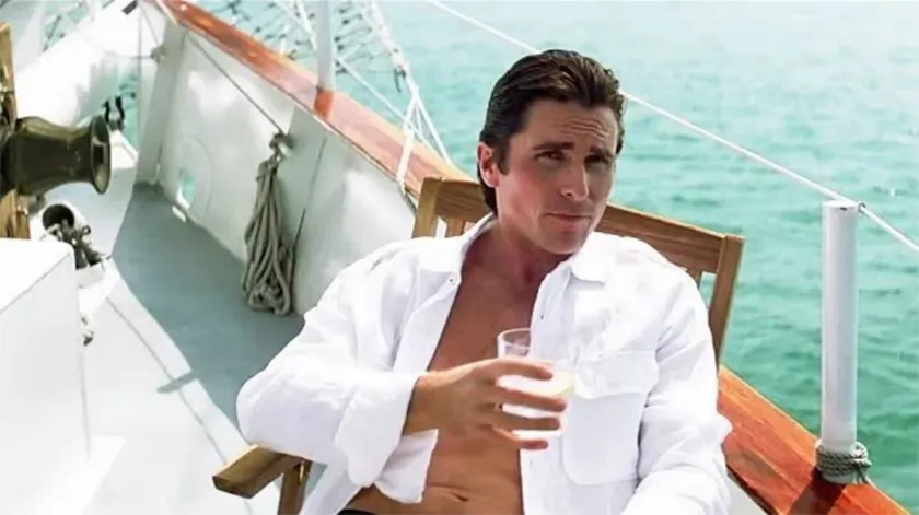 Christian Bale on a yacht in The Dark Knight