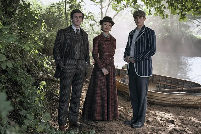 Dónal Finn, Zine Tseng, and Hero Fiennes Tiffin in Young Sherlock