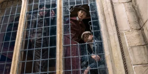 Dónal Finn, Zine Tseng, and Hero Fiennes Tiffin in Young Sherlock