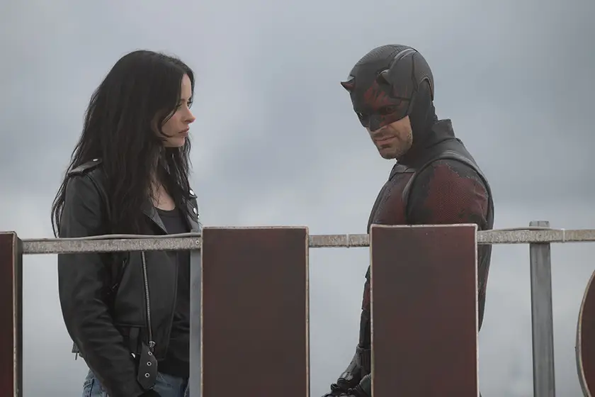 Jessica Jones (Krysten Ritter) and Matt Murdock / Daredevil (Charlie Cox) talk facing each other in Daredevil: Born Again Season 2