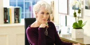 Miranda Priestly sits at her desk