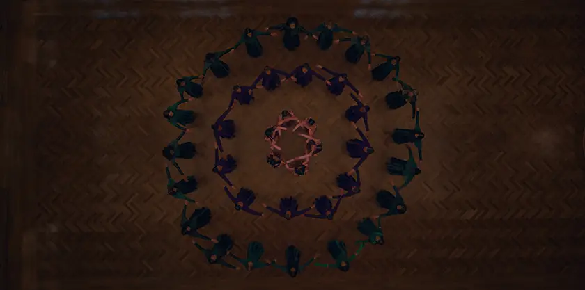 Girls form thee concentrical circles seen from above in a still from The Testaments