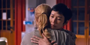 Two women hug in a still from Ryūsuke Hamaguchi's All of a Sudden (Soudain)