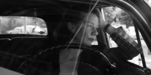 Sandra Hüller looks out of a car's window in Paweł Pawlikowski's Fatherland
