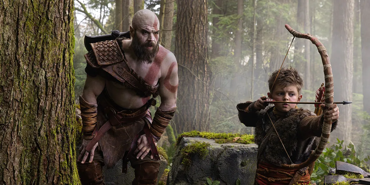 Kratos and Atreus in a still featured in an article with everything we know about the God of War Series
