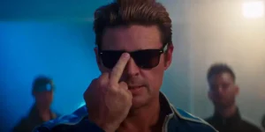 Johnny Cage puts his sunglasses on using his middle finger