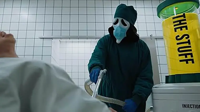 Ghostface injects a substance into someone from a tank named "the stuff" in a scene from Scary Movie (2026) that parodies the film "The Substance"