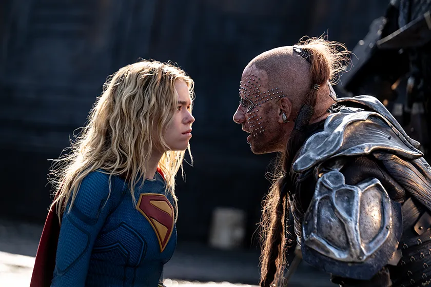 Milly Alcock as Supergirl and Matthias Schoenaerts as Krem in Supergirl (2026).