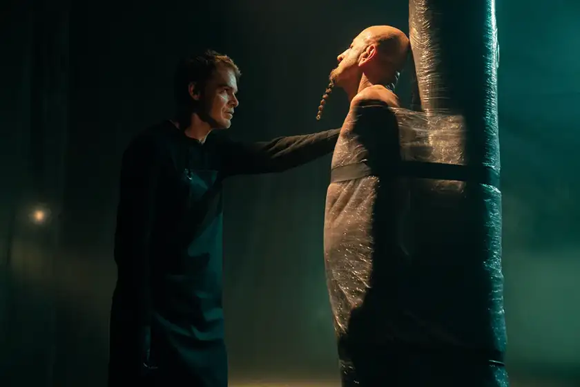 Michael C. Hall as Dexter Morgan and Shavo Odadjian as R.H. Martin in ‘Dexter: Resurrection’ Season 2, which this article explores everything we know about