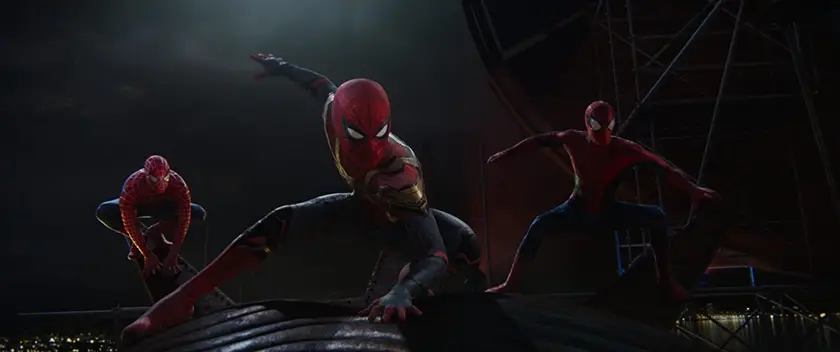 Tobey Maguire, Tom Holland and Andrew Garfield in Spider-Man: No Way Home, one of the movies in the MCU's Spider-Man trilogy discussed in this retrospective