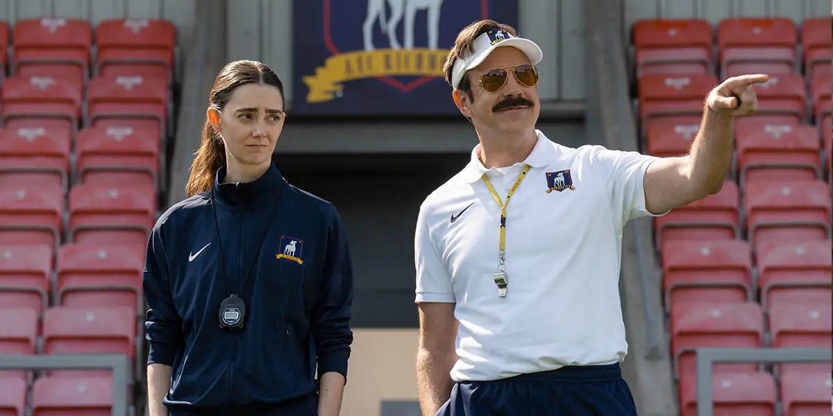 Tanya Reynolds and Jason Sudeikis are on the football pitch during training in "Ted Lasso" Season 4, which this article explores everything you need to know about