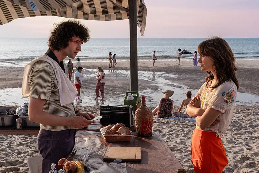 Dominic Sessa and Emilia Jones are on the beach in the film Tony (2026)