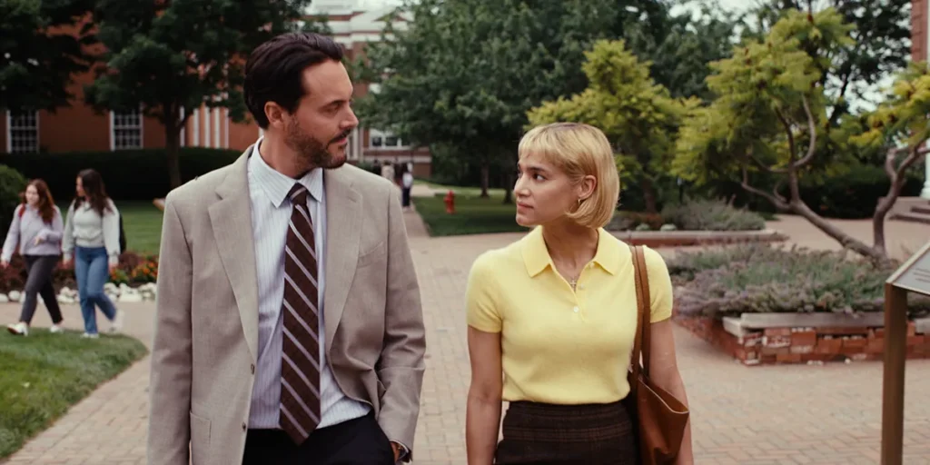 A man and a woman walk in a still from The Basics of Philosophy