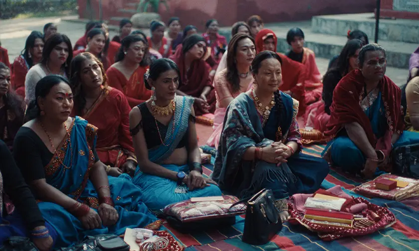 Women sit on the floor in a still from Elephants in the Fog (Tiniharu)